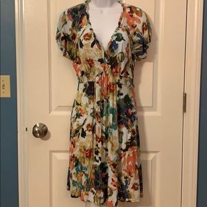 Floral Dress. Vneck with ruffle trim.